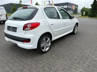 Gebraucht Peugeot 206+ 73 PS (53 kW) 2012 Weiß Kleinwagen