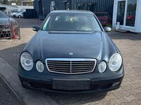 Second-hand Mercedes E220 150 CP (110 kW) 2004 Negru Berlinǎ