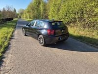 Second-hand BMW 116 116 CP (85 kW) 2012 Negru Hatchback
