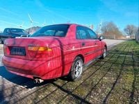 Gebraucht Mitsubishi Carisma 120 PS (88 kW) 1999 Rot Limousine