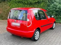 Gebraucht Skoda Roomster Plus Edition 75 PS (55 kW) 2011 Rot Van / Kleinbus