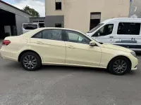 Używany Mercedes E200 136 KM (100 kW) 2016 Żółty Sedan/Limuzyna