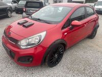 Gebraucht Kia Rio Edition 7 109 PS (80 kW) 2013 (beg) signal red (bordeaux) (metallic) Limousine