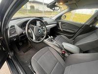Gebraucht BMW 118 143 PS (105 kW) 2010 Schwarz Kleinwagen