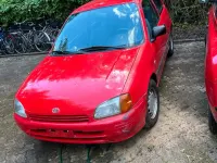 Gebraucht Toyota Starlet 55 PS (40 kW) 1997 Rot Kleinwagen