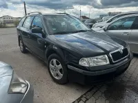 Używany Skoda Octavia 110 KM (80 kW) 2003 Czarny Kombi