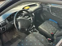 Usata Opel Astra 60 CV (44 kW) 1994 Viola Utilitaria