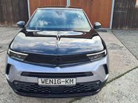 Gebraucht Opel Mokka-e GS Line 100 kW (136 PS) 2023 Artense/ dach &haube schwarz SUV