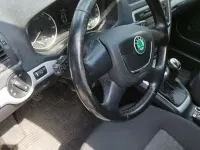 Używany Skoda Octavia Ambiente 122 KM (89 kW) 2011 Czarny Kombi