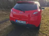 Gebraucht Mazda 2 75 PS (55 kW) 2010 Rot Kleinwagen