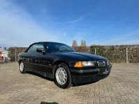 Gebraucht BMW 318 116 PS (85 kW) 1999 Cosmosschwarz metallic Cabrio