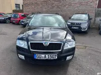 Używany Skoda Octavia 102 KM (75 kW) 2004 Czarny Kombi