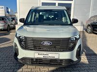 Gebraucht Ford Tourneo Courier Trend 125 PS (91 kW) 2024 Cactus gray Van / Kleinbus