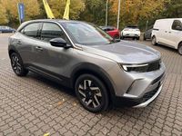 Gebraucht Opel Mokka-e Elegance 100 kW (136 PS) 2022 Kontrast grau metallic SUV
