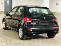 Gebraucht Peugeot 206 75 PS (55 kW) 2010 Schwarz Kleinwagen