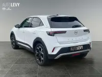 Gebraucht Opel Mokka-e Ultimate 100 kW (136 PS) 2023 Weiss banquise/typ aussenverkleidung spi (metallic) SUV