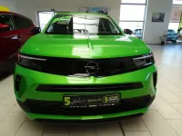 Gebraucht Opel Mokka Elegance 101 PS (74 kW) 2024 Matcha green SUV