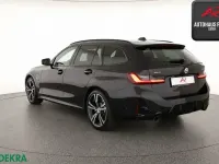 Gebraucht BMW 320e M Sport 204 PS (150 kW) 2022 Black sapphire Kombi