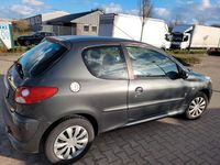 Gebraucht Peugeot 206 73 PS (53 kW) 2012 Grau Limousine