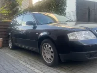 Używany Audi A6 165 KM (121 kW) 1999 Czarny Kombi