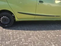 Gebraucht Daihatsu Cuore 69 PS (50 kW) 2008 Grün Kleinwagen