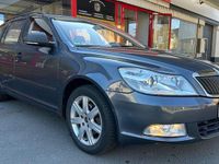 Używany Skoda Octavia 105 KM (77 kW) 2011 Szary Kombi
