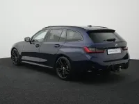 Gebraucht BMW 330 M Sport 286 PS (210 kW) 2022 Tansanitblau ii metallic Kombi