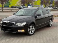 Second-hand Skoda Superb 140 CP (102 kW) 2012 Negru Break