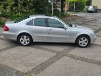 Używany Mercedes E320 204 KM (150 kW) 2004 Srebrny Sedan/Limuzyna