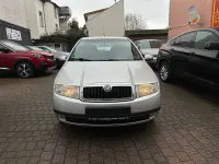 Używany Skoda Fabia 75 KM (55 kW) 2004 Srebrny Sedan/Limuzyna