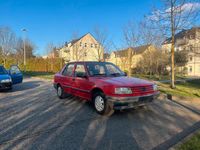 Gebraucht Peugeot 309 75 PS (55 kW) 1992 Rot Kleinwagen