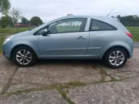 Używany Opel Corsa 68 KM (50 kW) 2007 Niebieski Hatchback