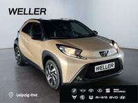 Gebraucht Toyota Aygo X 72 PS (52 kW) 2025 Ginger beige / night sky black SUV