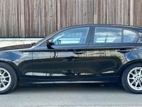 Gebraucht BMW 116 122 PS (89 kW) 2009 Schwarz Kleinwagen