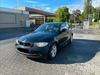 Gebraucht BMW 116 122 PS (89 kW) 2009 Schwarz Kleinwagen
