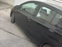 Gebraucht Daihatsu Cuore 70 PS (51 kW) 2009 Schwarz Kleinwagen