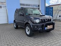 Second-hand Suzuki Jimny Style 86 CP (63 kW) 2012 Gri SUV