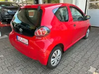 Gebraucht Toyota Aygo 68 PS (50 kW) 2011 Rot Kleinwagen