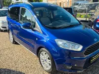Gebraucht Ford Tourneo Courier Titanium 101 PS (74 kW) 2015 Blau Van / Kleinbus