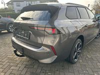 Gebraucht Opel Astra 131 PS (96 kW) 2024 Mondstein grau/vulkan grau Kombi