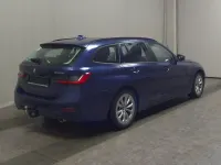 Gebraucht BMW 330 Advantage 252 PS (185 kW) 2021 Phytonicblau metallic (metallic) Kombi