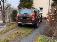 Używany Dacia Duster 105 KM (77 kW) 2011 Brązowy SUV