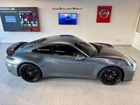 Gebraucht Porsche 911 Carrera 394 PS (289 kW) 2024 Vanadiumgrau metallic Coupé