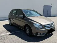 Używany Mercedes B180 109 KM (80 kW) 2013 Szary Minivan