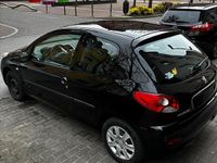 Gebraucht Peugeot 206+ 75 PS (55 kW) 2010 Schwarz Kleinwagen