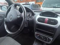 Second-hand Opel Corsa 90 CP (66 kW) 2004 Negru Hatchback
