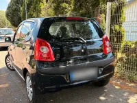 Gebraucht Nissan Pixo 68 PS (50 kW) 2010 Schwarz Kleinwagen