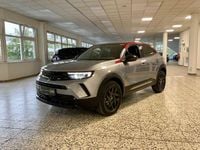 Gebraucht Opel Mokka GS Line 101 PS (74 kW) 2023 Kontrast grau/quarz silber (metallic) SUV