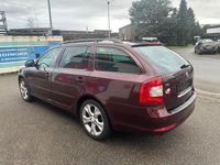 Gebraucht Skoda Octavia Ambiente 105 PS (77 kW) 2010 Rot Kombi