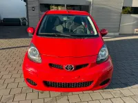 Gebraucht Toyota Aygo 68 PS (50 kW) 2009 Rot Kleinwagen